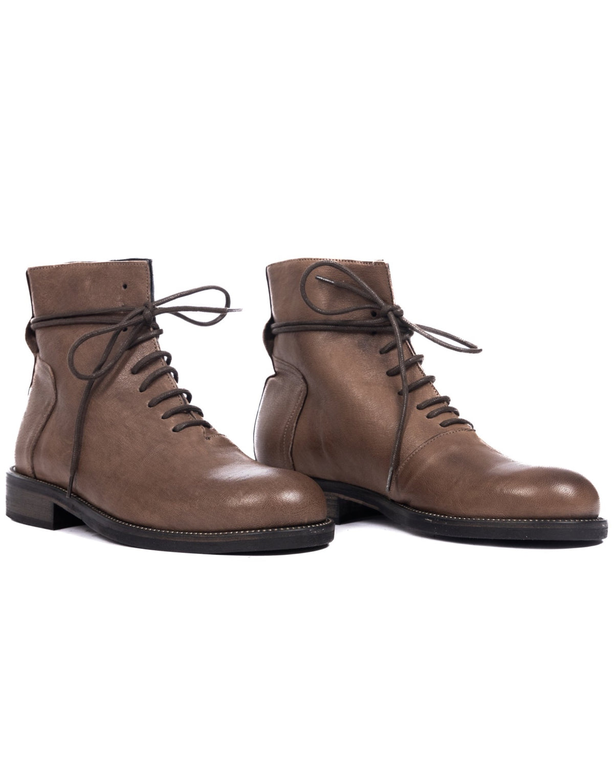 Brown leather lace-up ankle boots with round toe and low heel, featuring dark laces and minimalist design.
