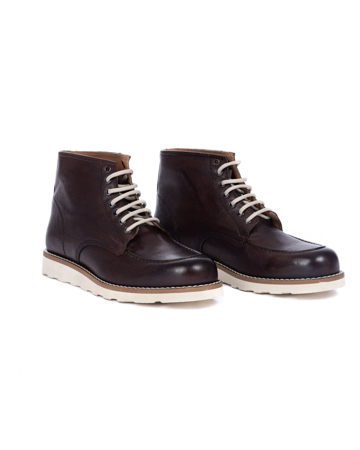 Dark brown leather lace-up ankle boots with white soles and cream laces, moc toe design