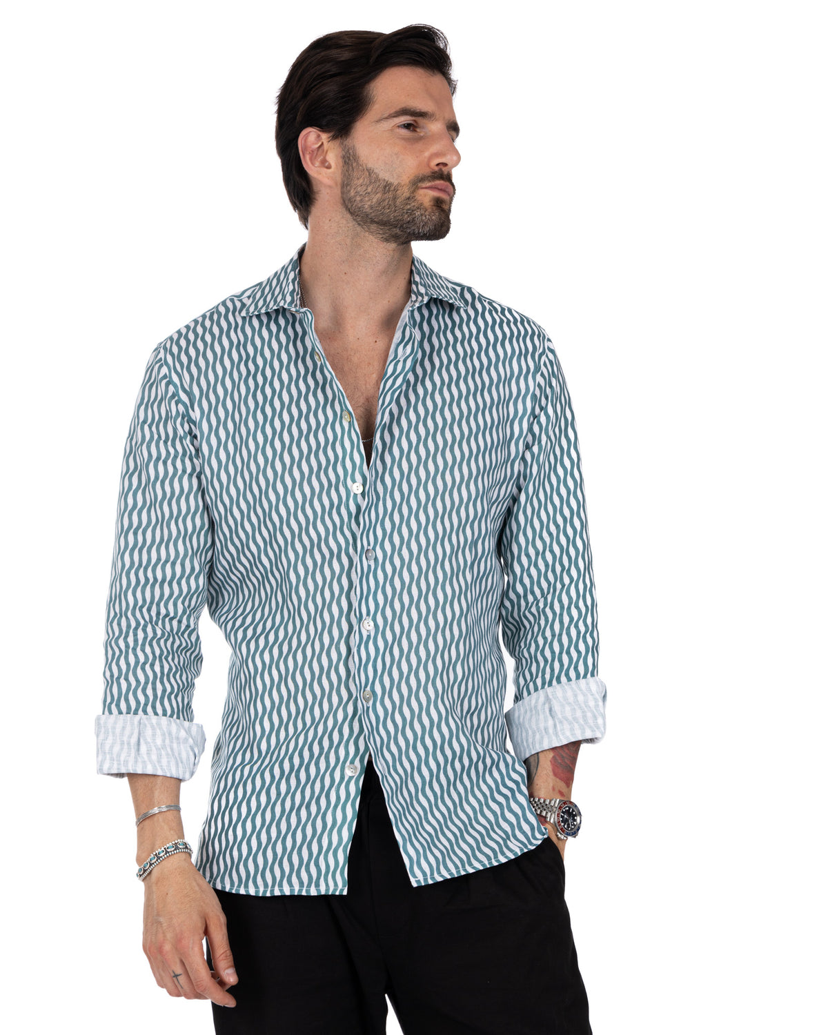 Men's slim-fit teal and white wavy striped linen button-down shirt with rolled cuffs and spread collar