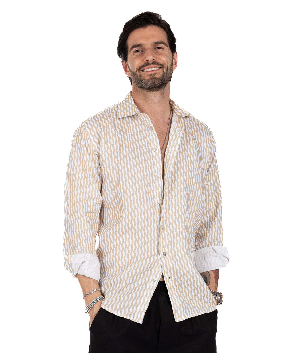 Men's beige wavy stripe linen button-down shirt with rolled cuffs, relaxed fit, and white inner lining.