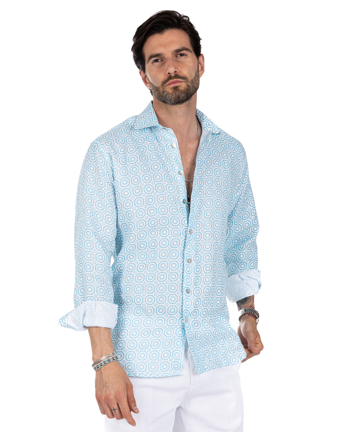 Men's light blue geometric print linen button-down shirt with rolled sleeves, casual summer style.