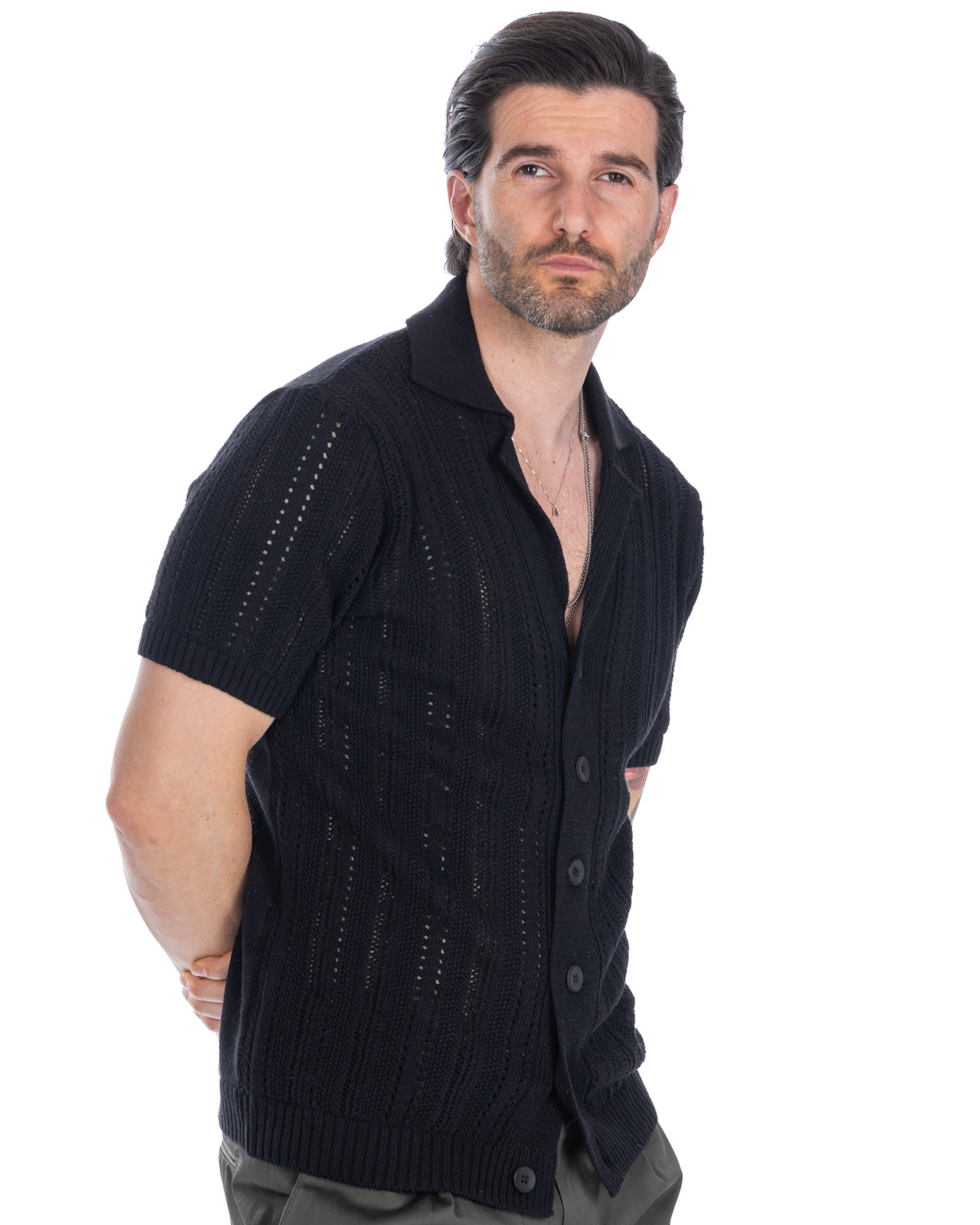 Men's black short sleeve knit cardigan with openwork pattern, button front, and polo collar. Lightweight summer sweater.