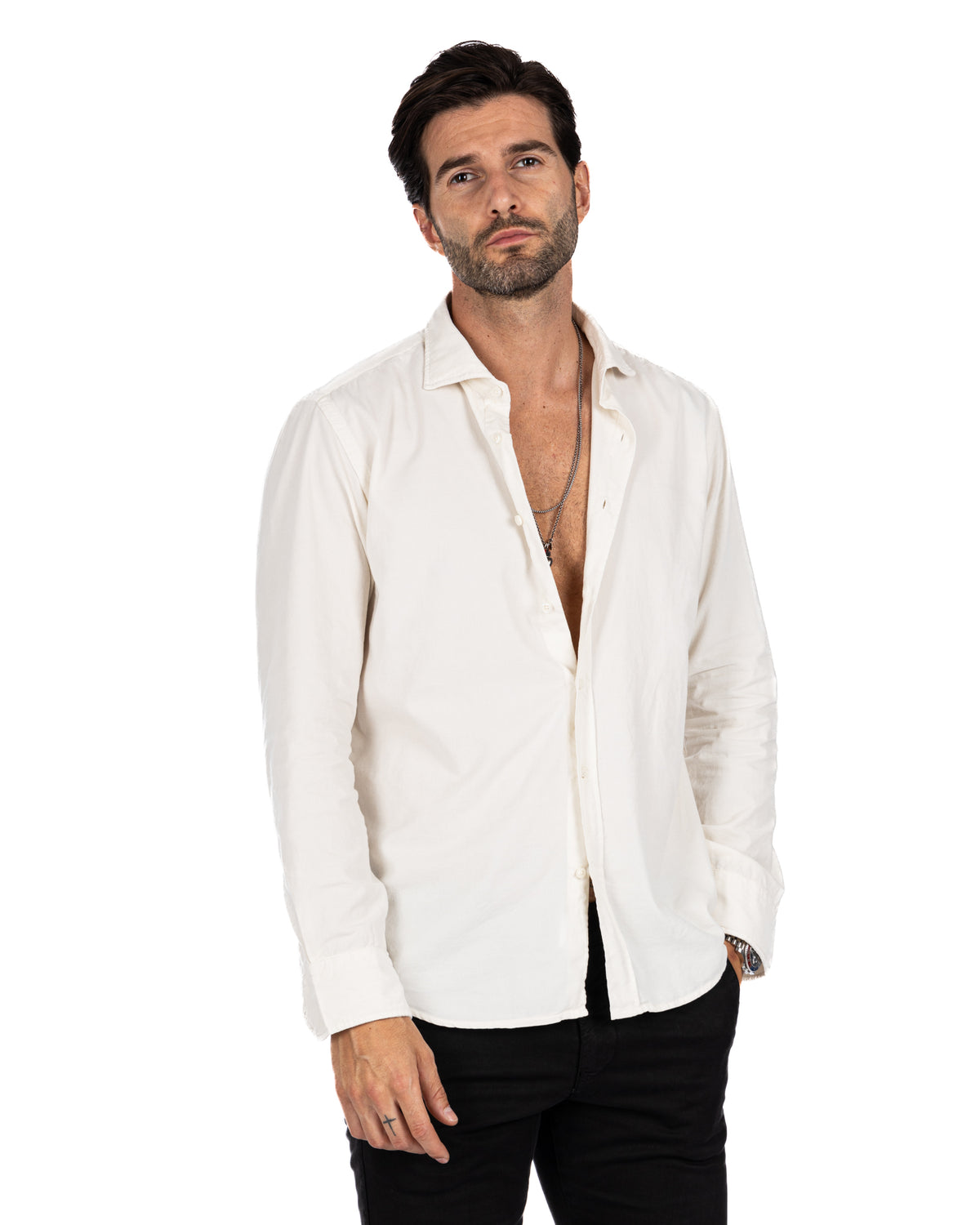Men's white linen button-down shirt, long sleeve, relaxed fit, casual style with open collar.