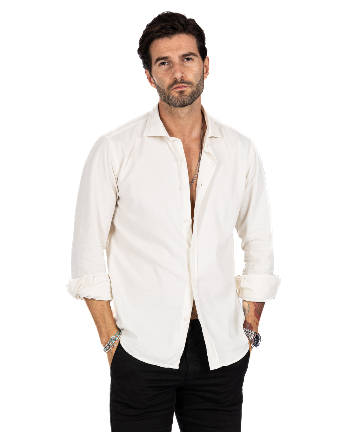 Men's white cotton long-sleeve button-down shirt, relaxed fit, casual style with rolled cuffs.