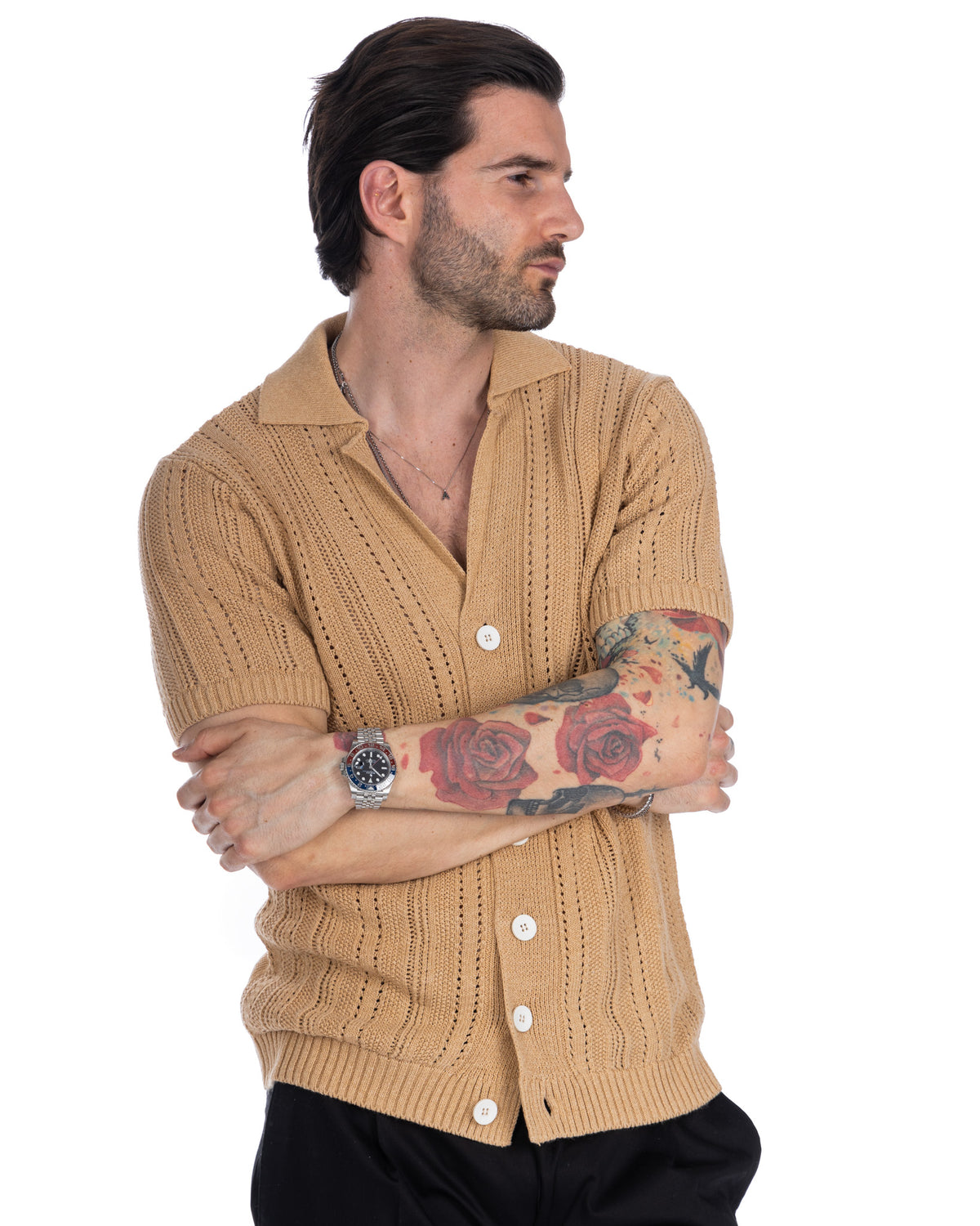 Men's beige cotton short sleeve knit cardigan with point collar, button front, and ribbed texture.