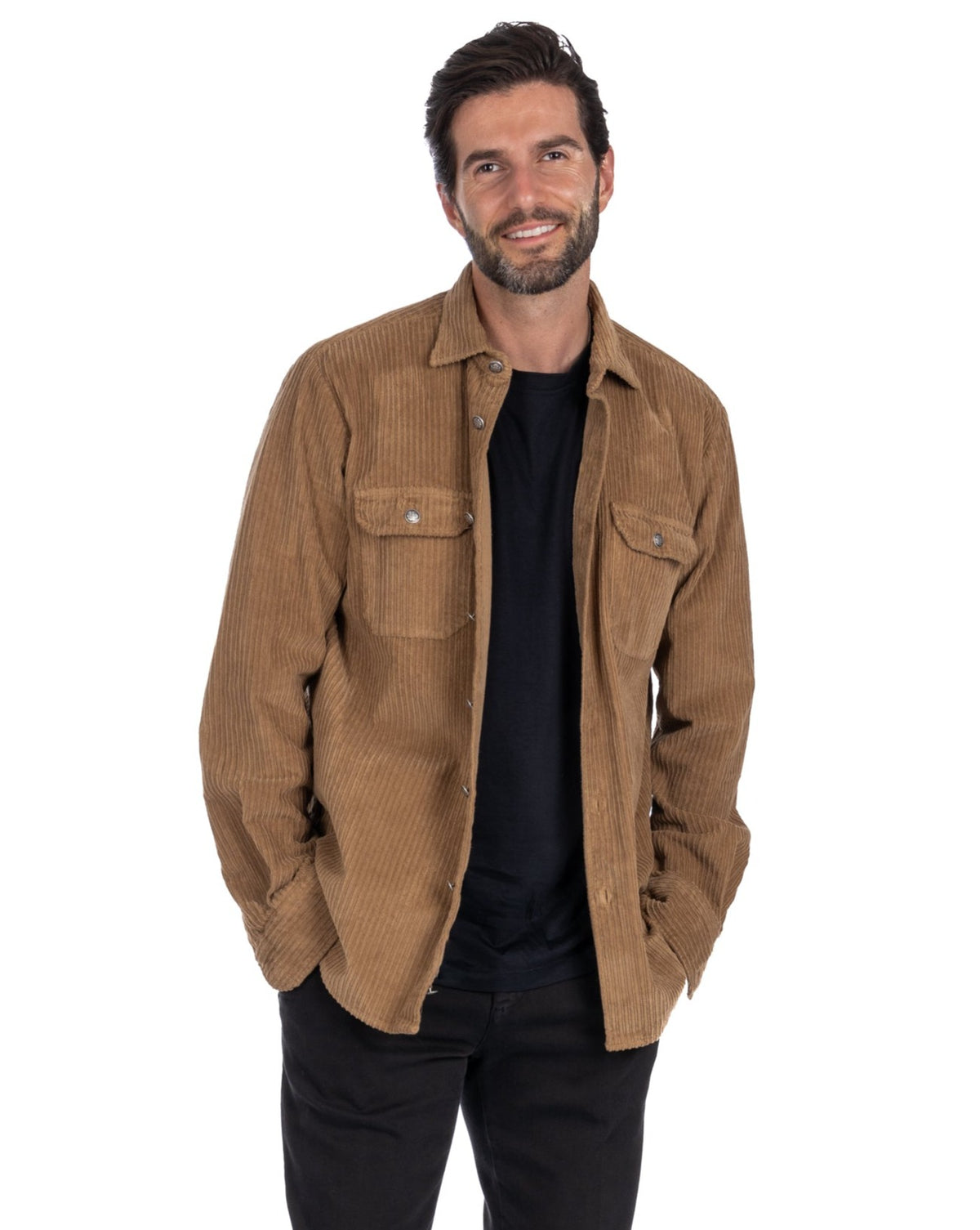 Men's tan corduroy button-up shirt jacket with chest pockets, worn open over black tee.