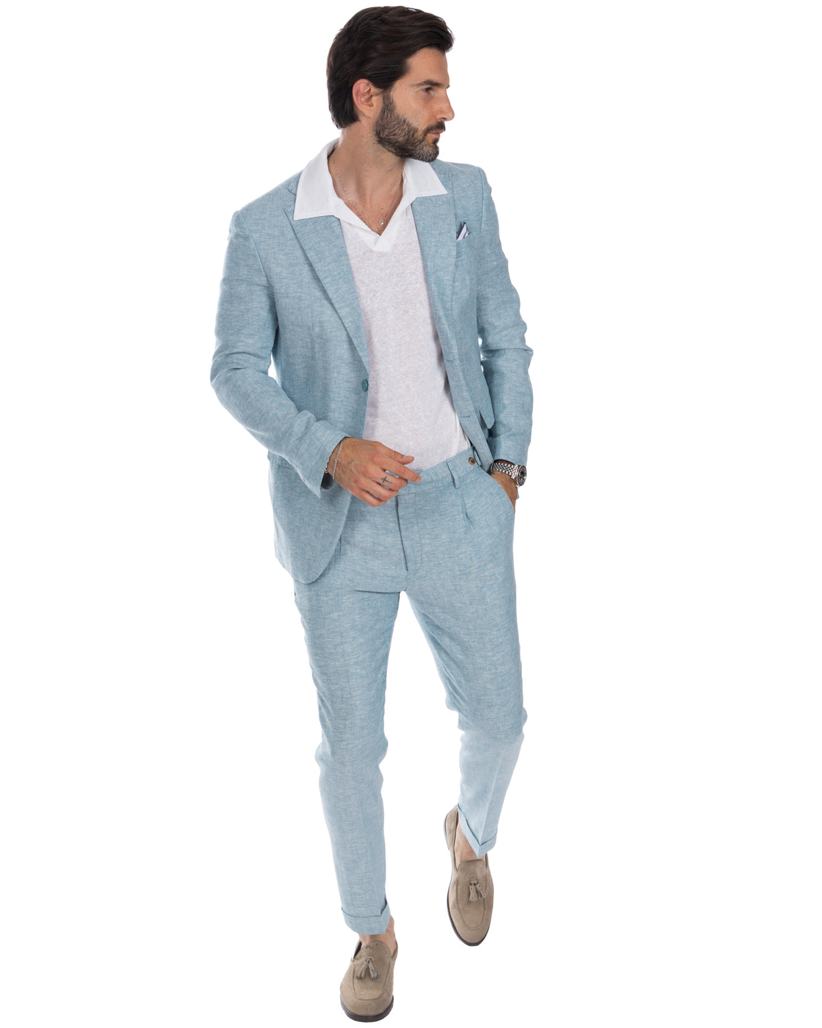Light blue linen suit with white polo shirt and tan suede loafers, men's summer formal wear.