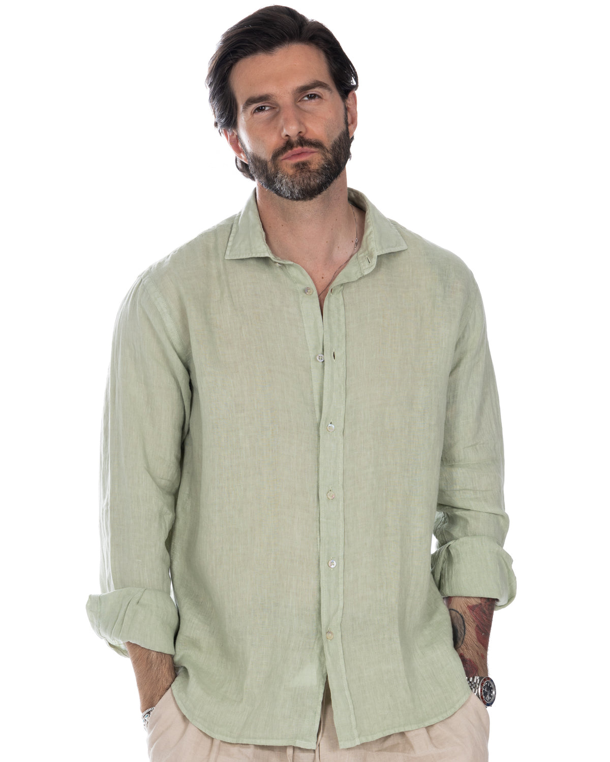 Men's light green linen button-down shirt with long sleeves, relaxed fit, and classic collar.