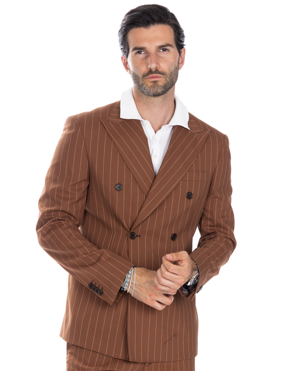 Men's brown pinstripe double-breasted wool suit jacket with peak lapels, paired with white dress shirt.