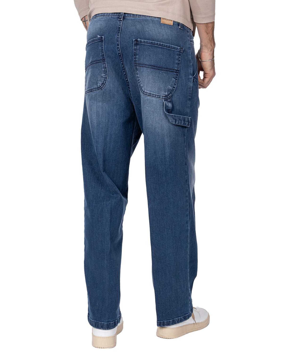 Men's dark blue relaxed fit denim jeans with back pockets, straight leg style and faded wash detail.