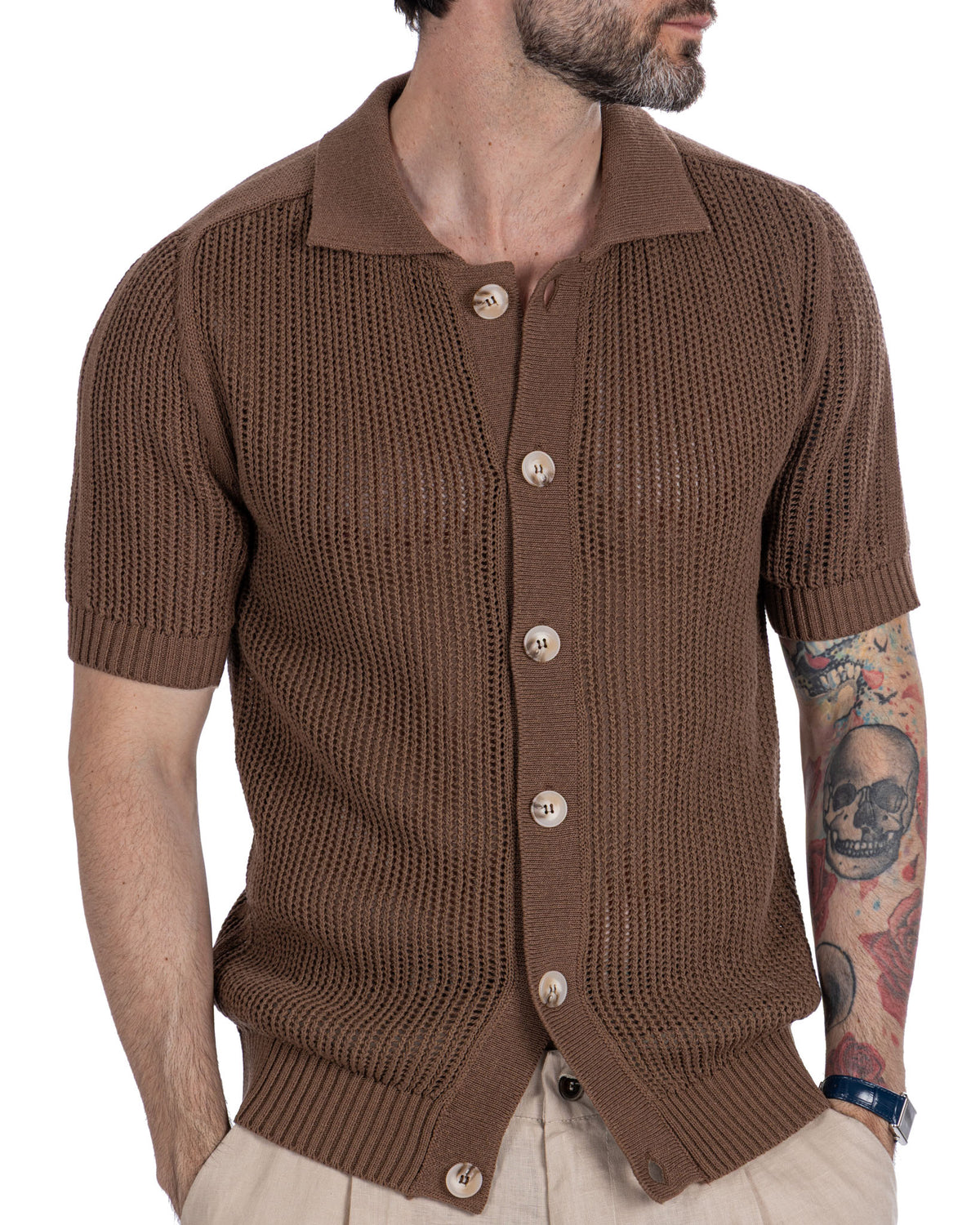 Brown short sleeve knit cardigan with polo collar, mother of pearl buttons, and waffle texture.