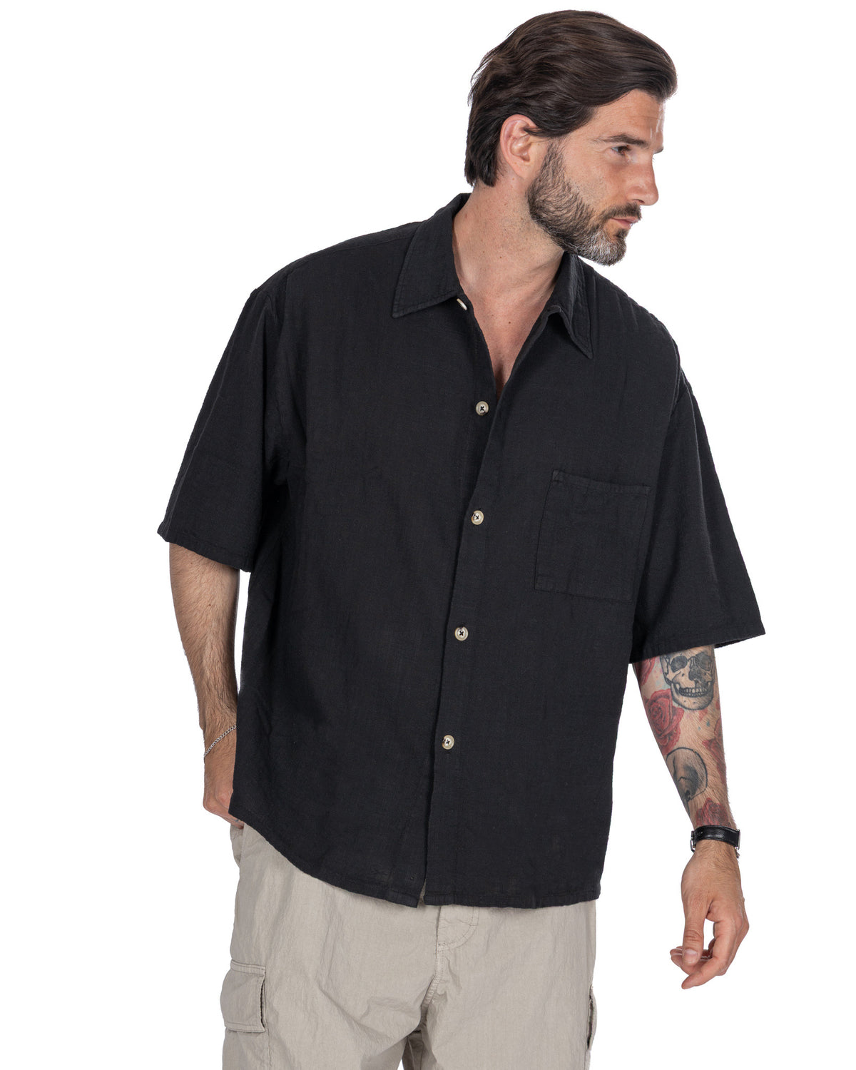Men's black short sleeve linen button-up shirt with camp collar and chest pocket, relaxed fit casual summer top