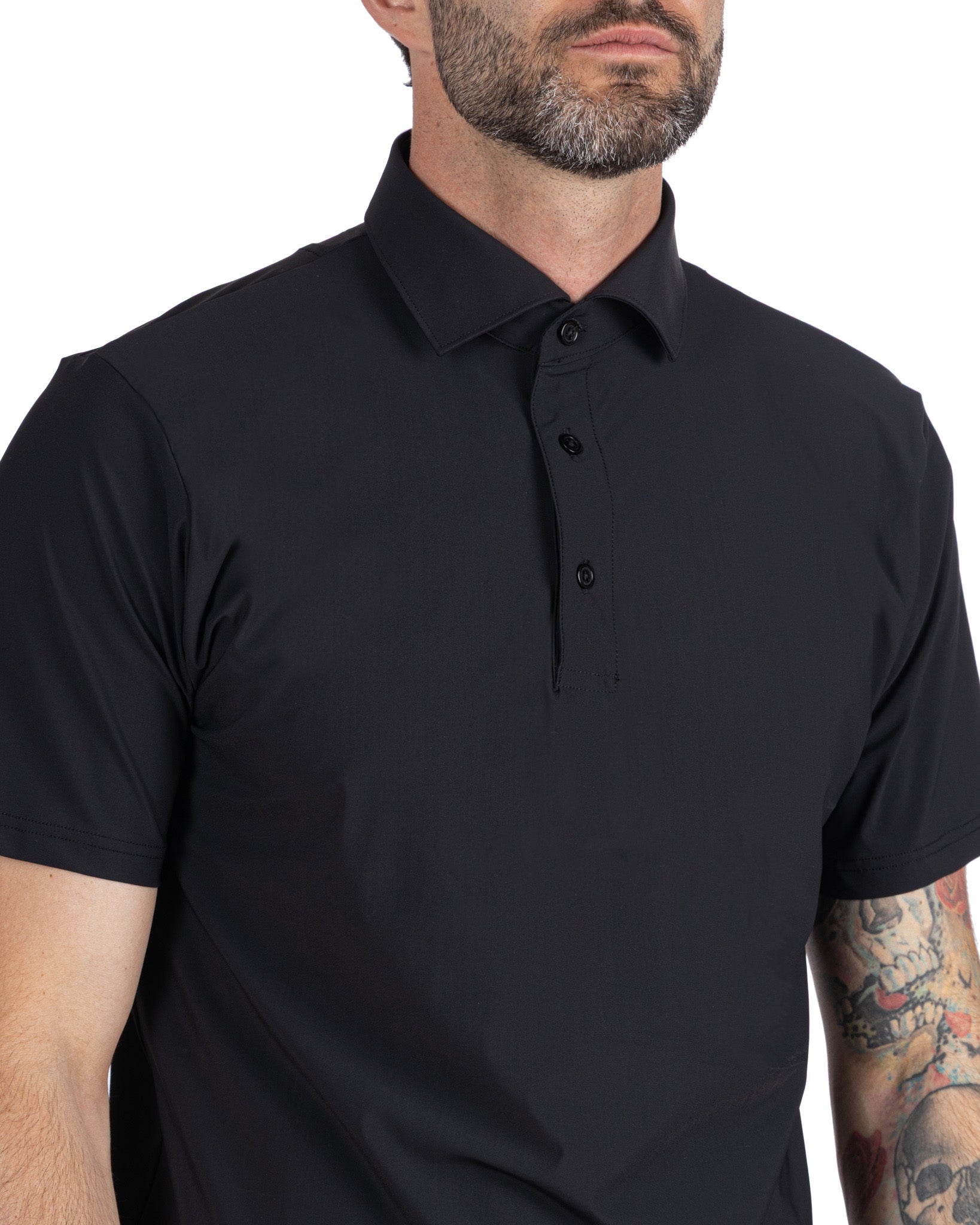 Polo Arnold tessuto travel nera