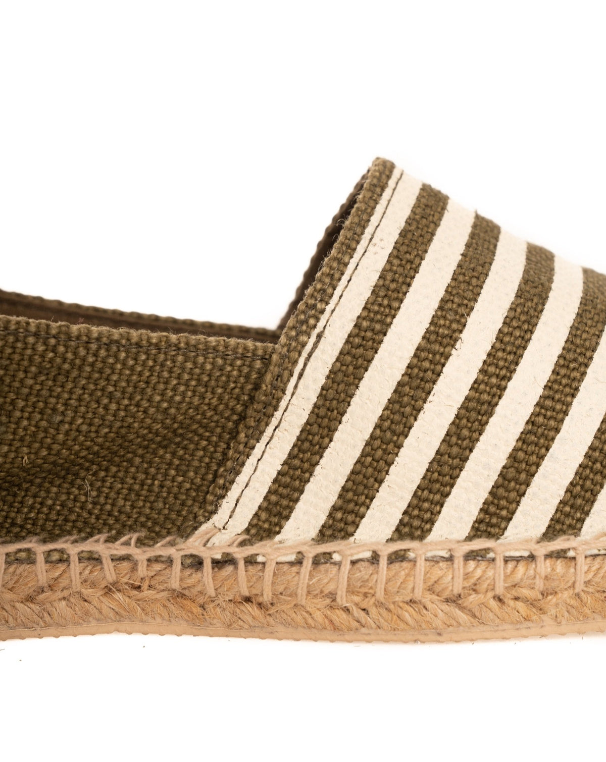 Olive green and white striped canvas espadrille slip-on with natural jute rope sole and woven texture detail.