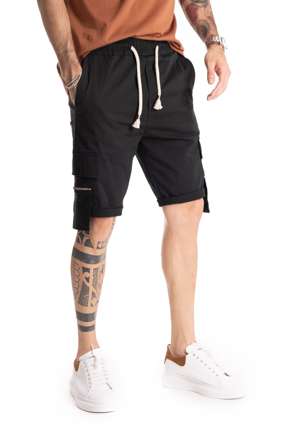 Black cargo shorts with drawstring waist and utility pockets, full-length front view