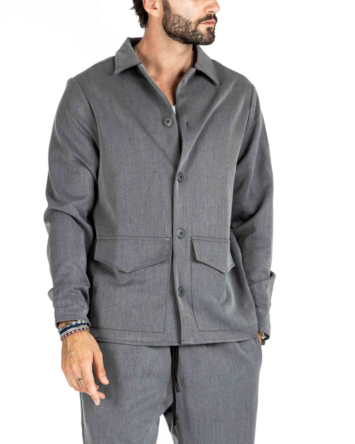 Men's heather gray overshirt jacket with pointed chest pockets, shown on a model