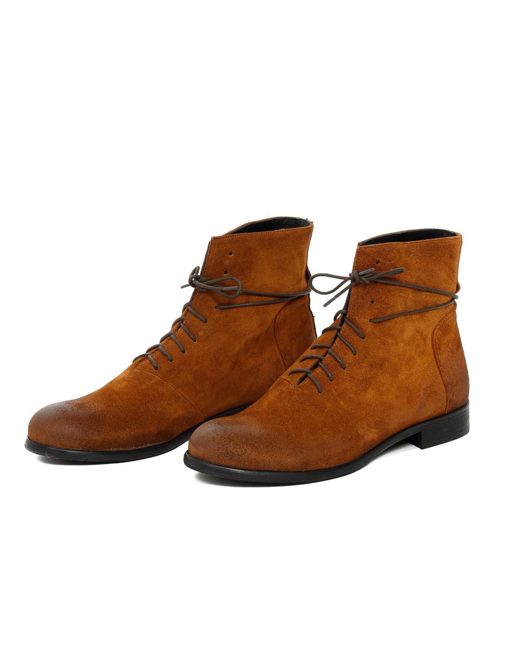 Pair of rust brown suede lace-up ankle boots with grey cord laces, shown at an angle