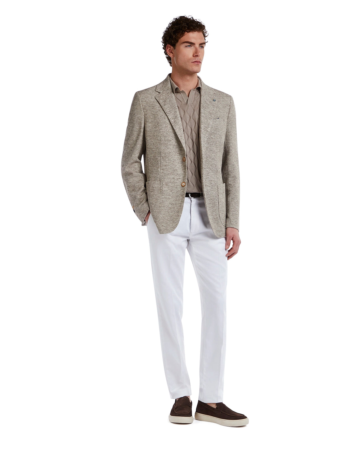 Light beige blazer made of textured fabric, paired with a beige quilted shirt and white trousers, stylish casual wear.
