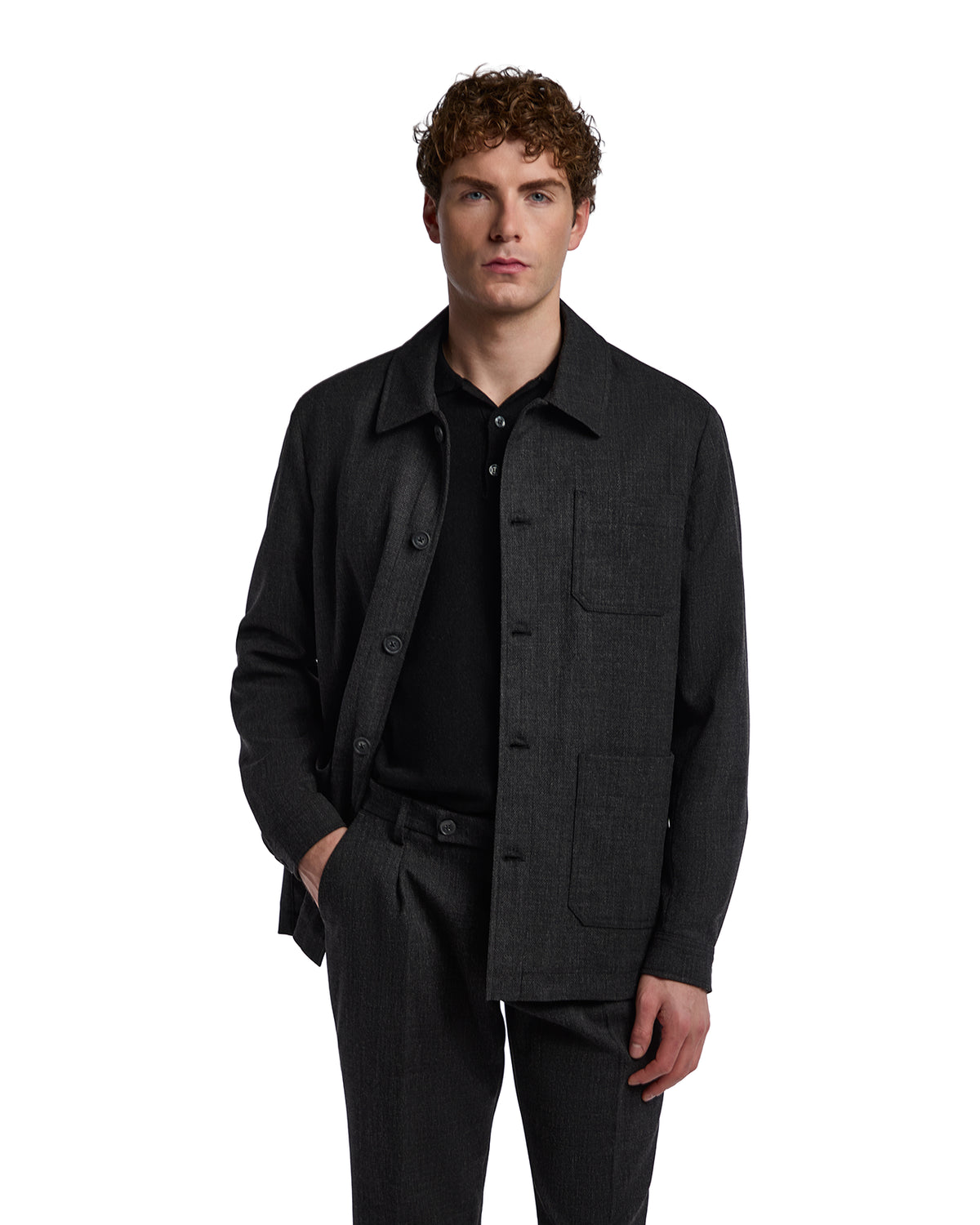 Men's charcoal gray button-up jacket made from lightweight fabric, featuring a relaxed fit and front pockets.