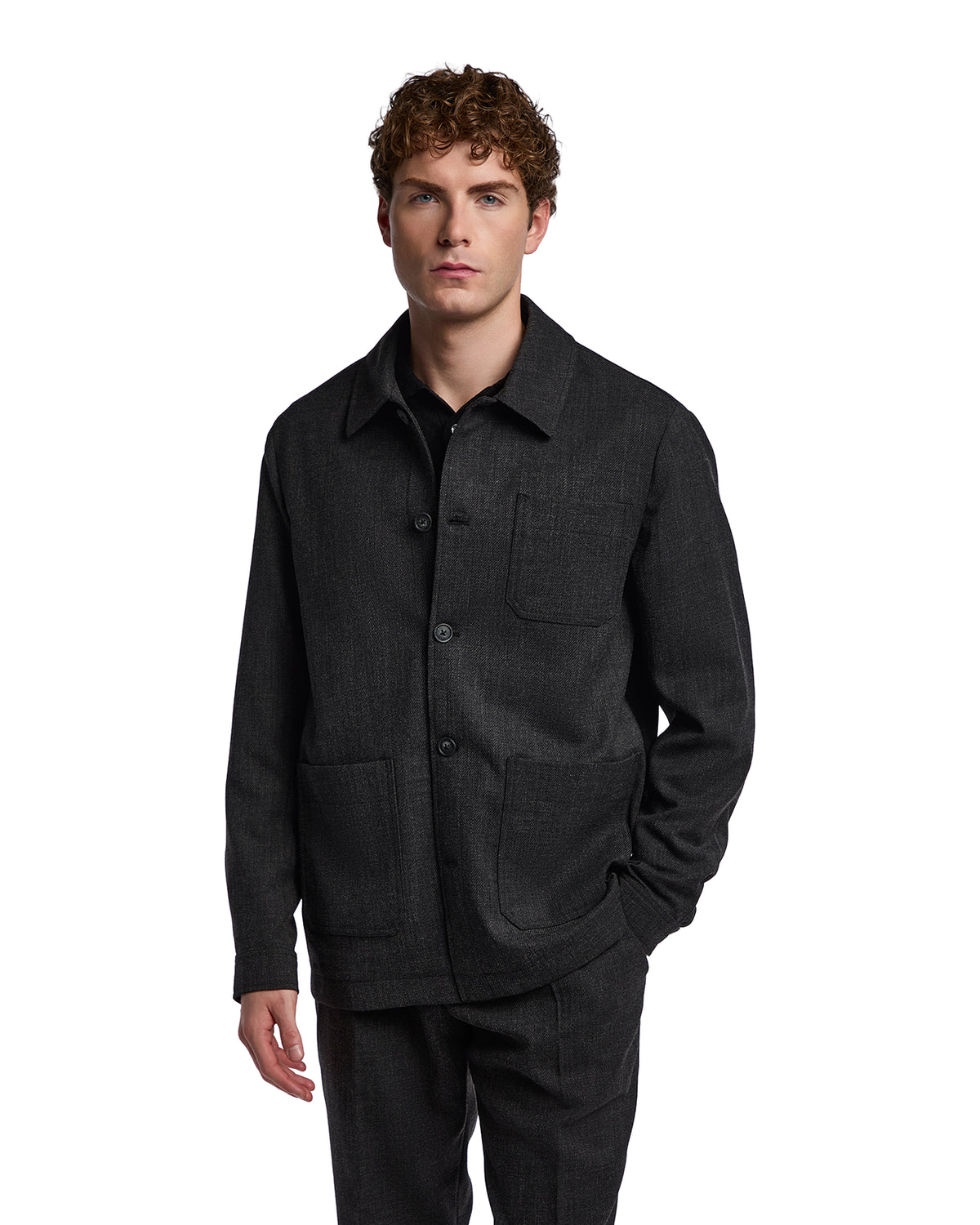 Men's black linen blend jacket with two front pockets and button closure, perfect for a modern, stylish look.