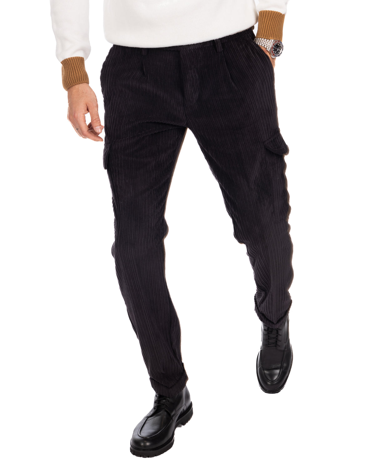 Men's black corduroy cargo pants with tapered fit, side pockets, and cuffed ankles. Casual winter style.
