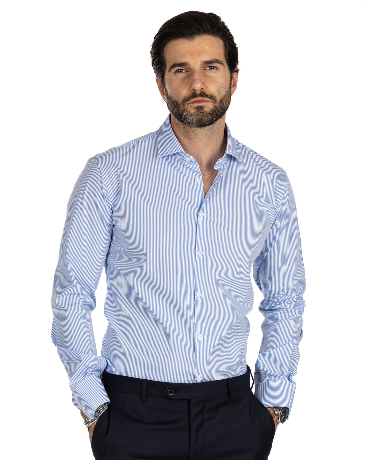 Men's light blue striped cotton dress shirt with spread collar, long sleeves, and button-down front.