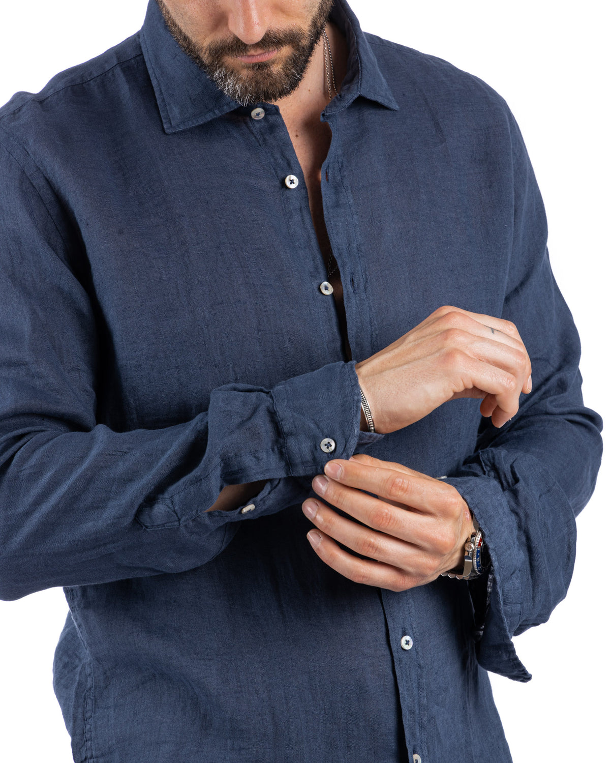 Navy blue linen button-down shirt for men, long sleeve casual style with white buttons and relaxed fit.
