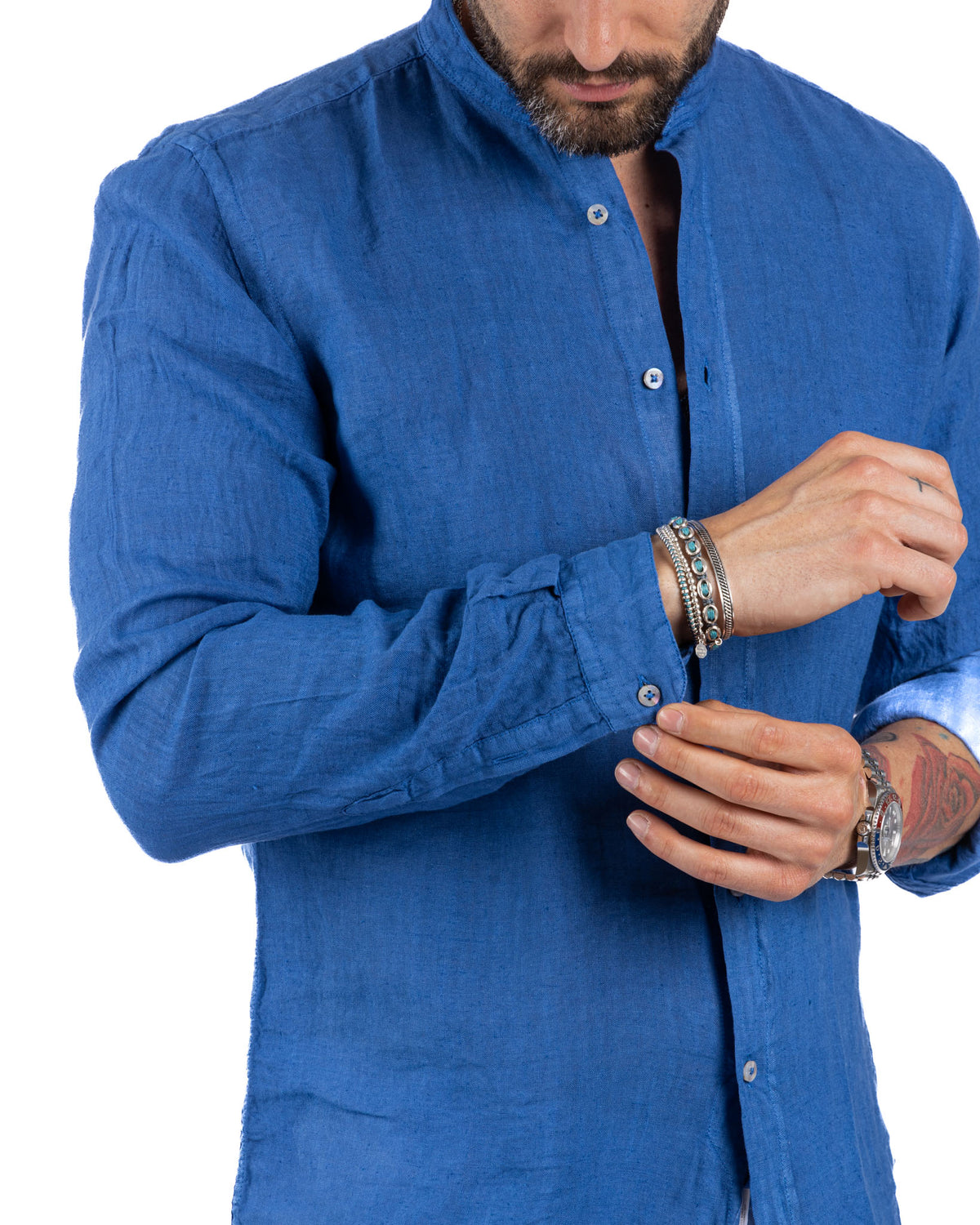 Men's blue linen button-down shirt with mandarin collar, long sleeves, and relaxed fit.
