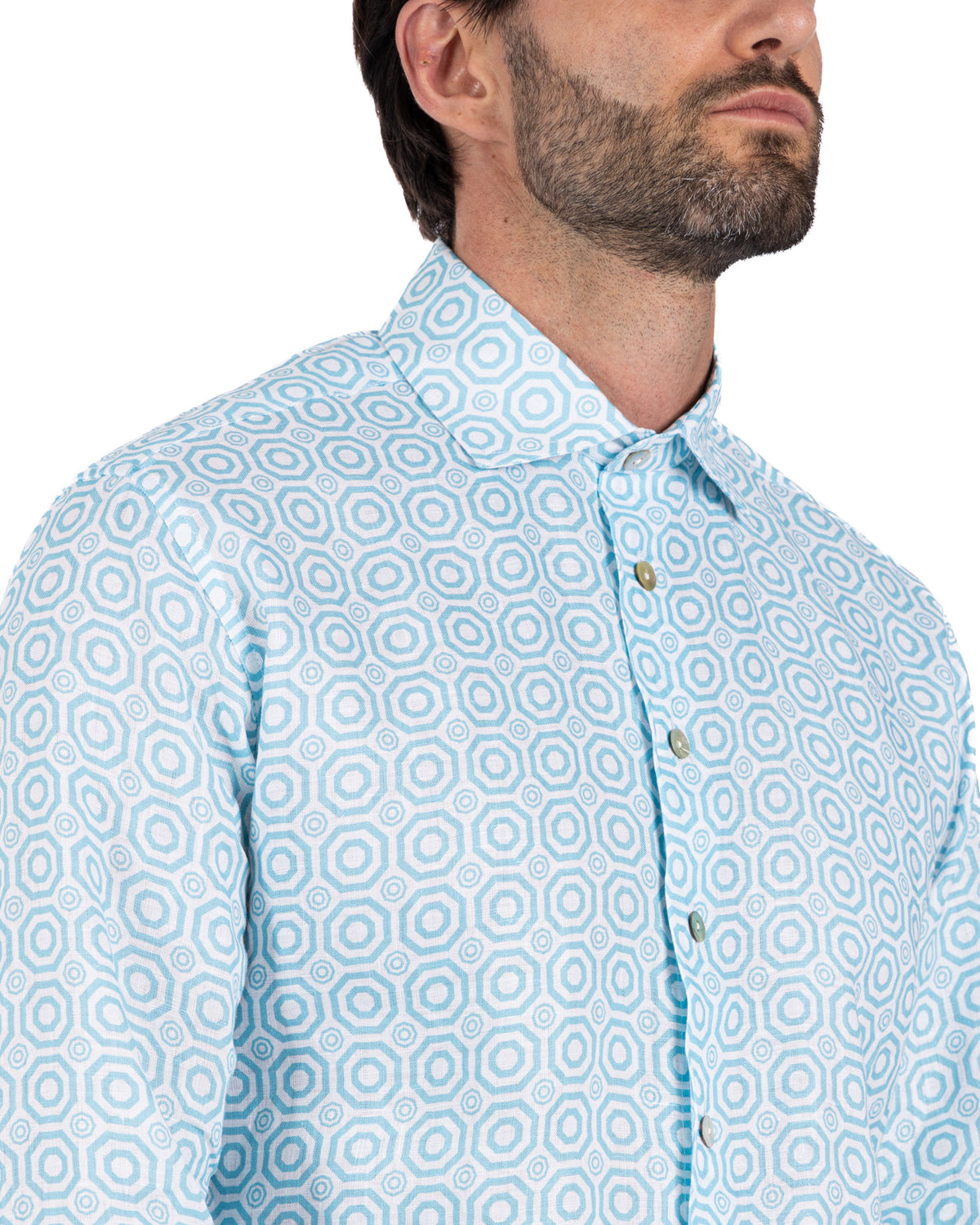 Men's light blue geometric hexagon print linen button-down shirt with spread collar and green buttons