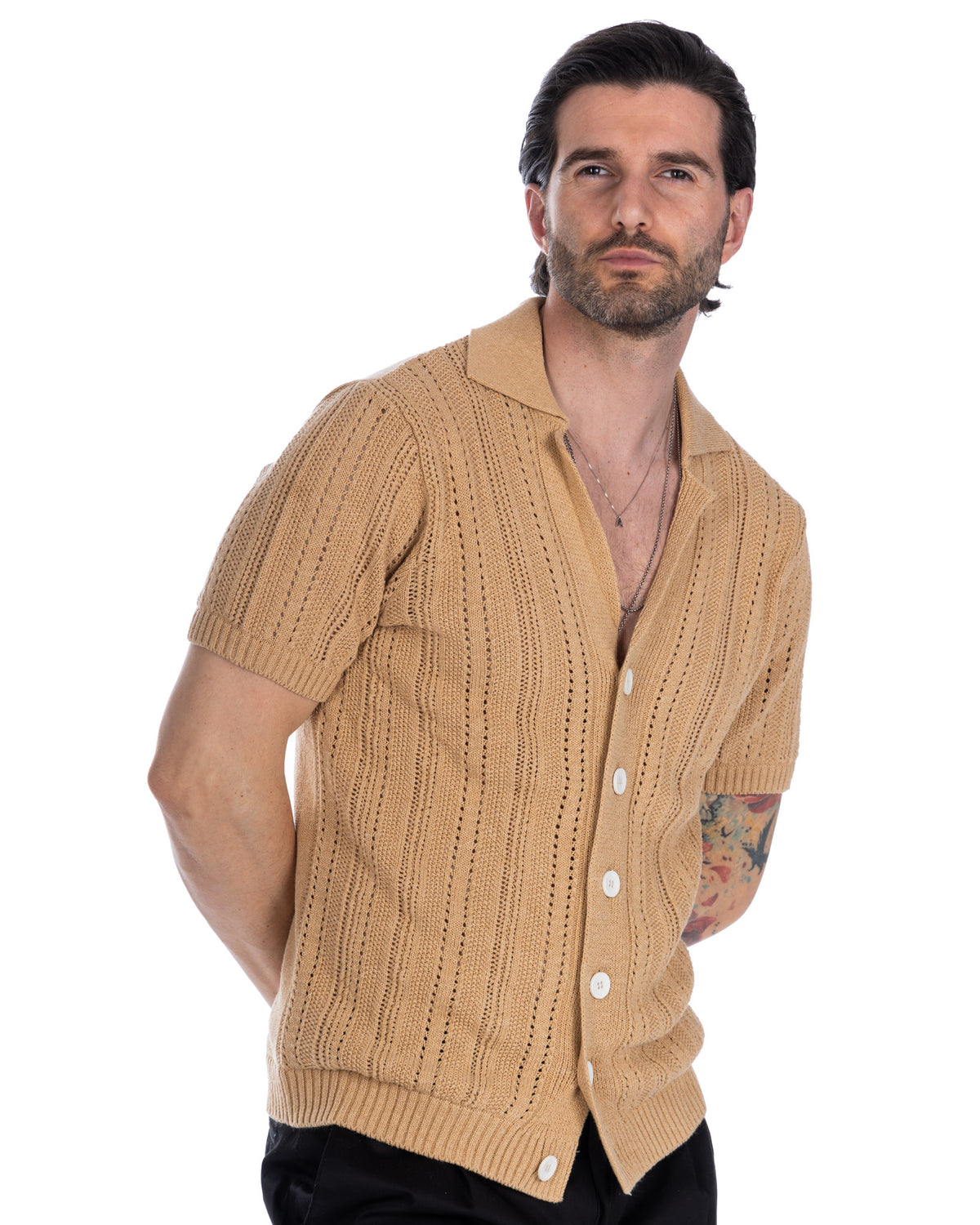 Men's beige short sleeve cable knit cardigan with white buttons, polo collar, and ribbed trim.