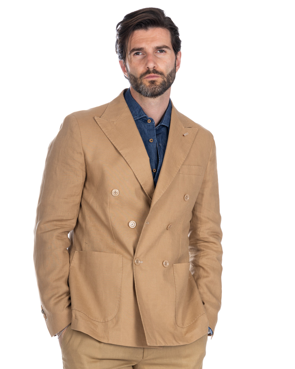 Tan linen double-breasted blazer with patch pockets, paired with blue denim shirt. Men's summer suit jacket.