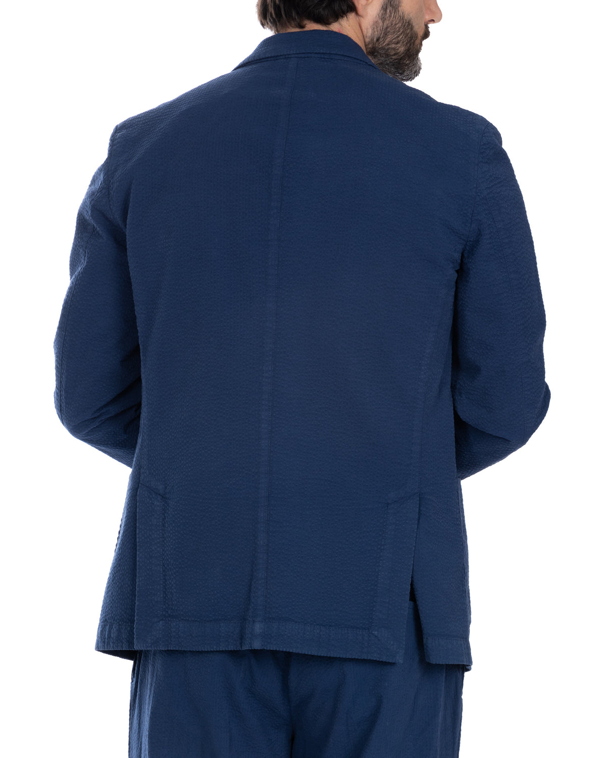 Navy blue textured seersucker suit jacket, unlined back view, single vent, relaxed fit summer blazer
