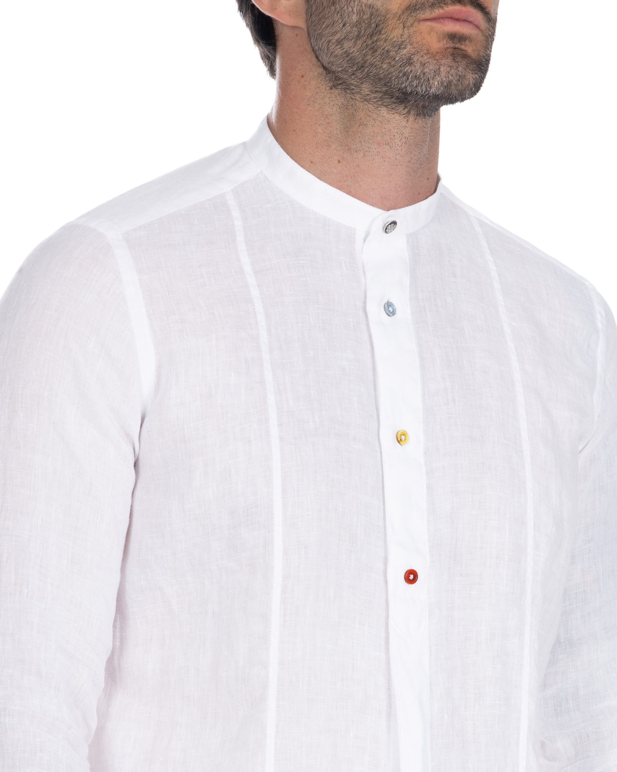 White linen band collar shirt with colorful contrast buttons, long sleeves, and relaxed fit.