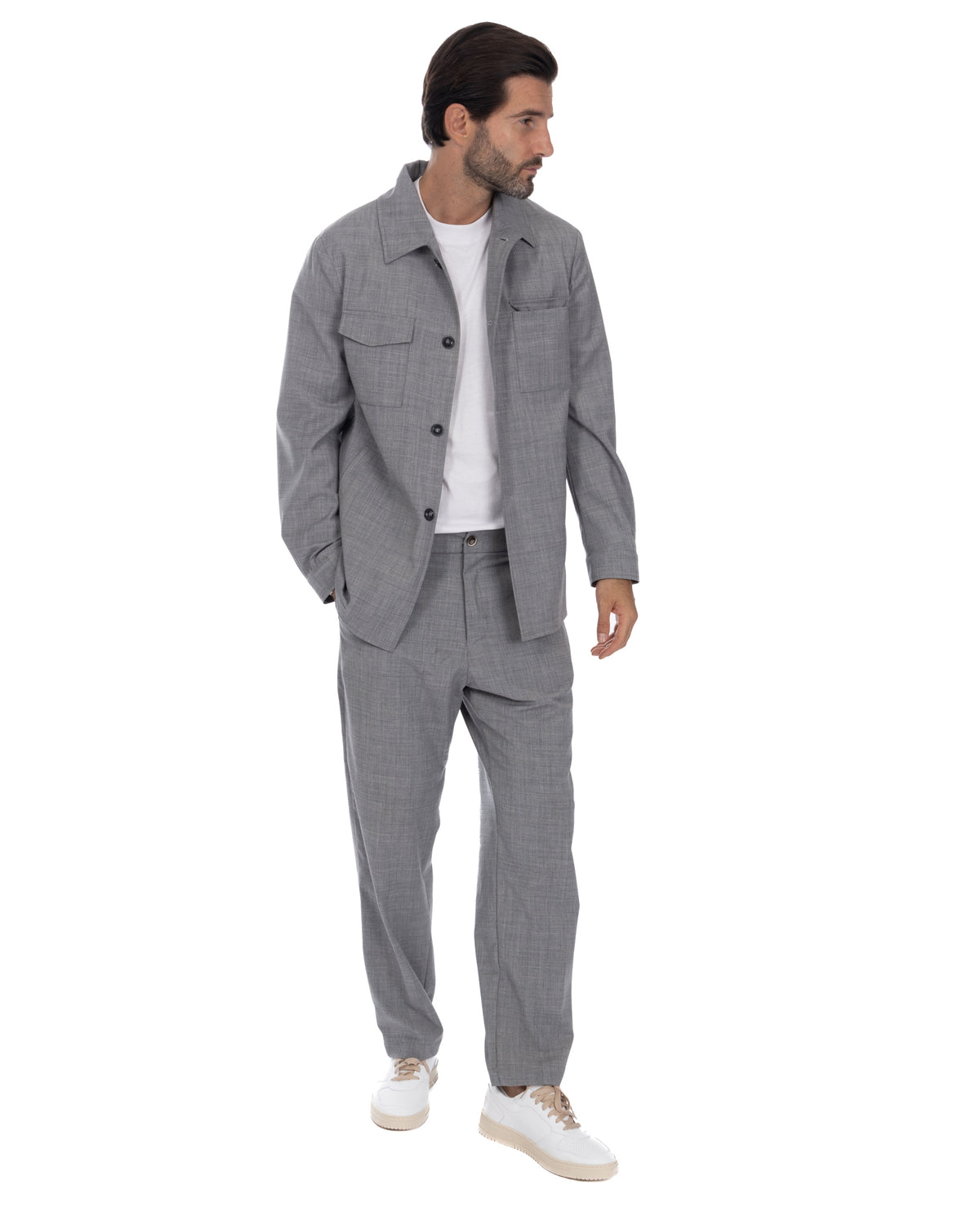 Men's gray wool blend overshirt and pants set with button front, chest pockets, paired with white t-shirt and sneakers.