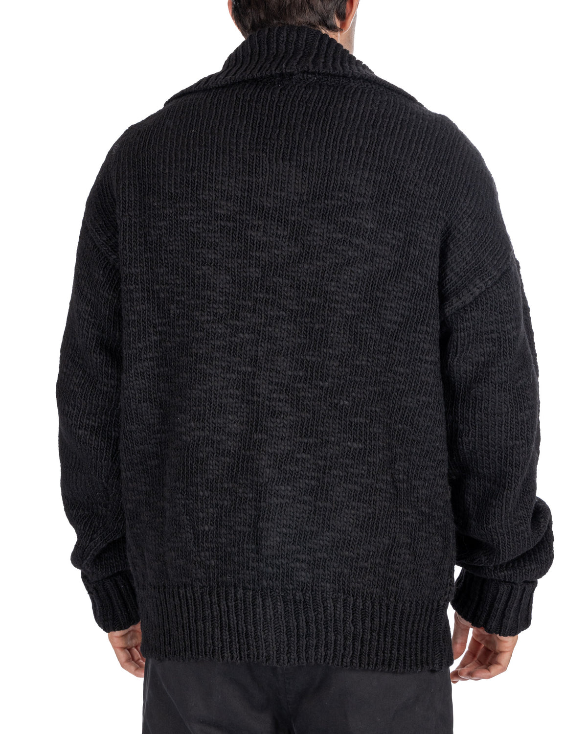 Black chunky knit turtleneck sweater for men, thick wool blend texture, ribbed cuffs and hem, warm winter pullover style.