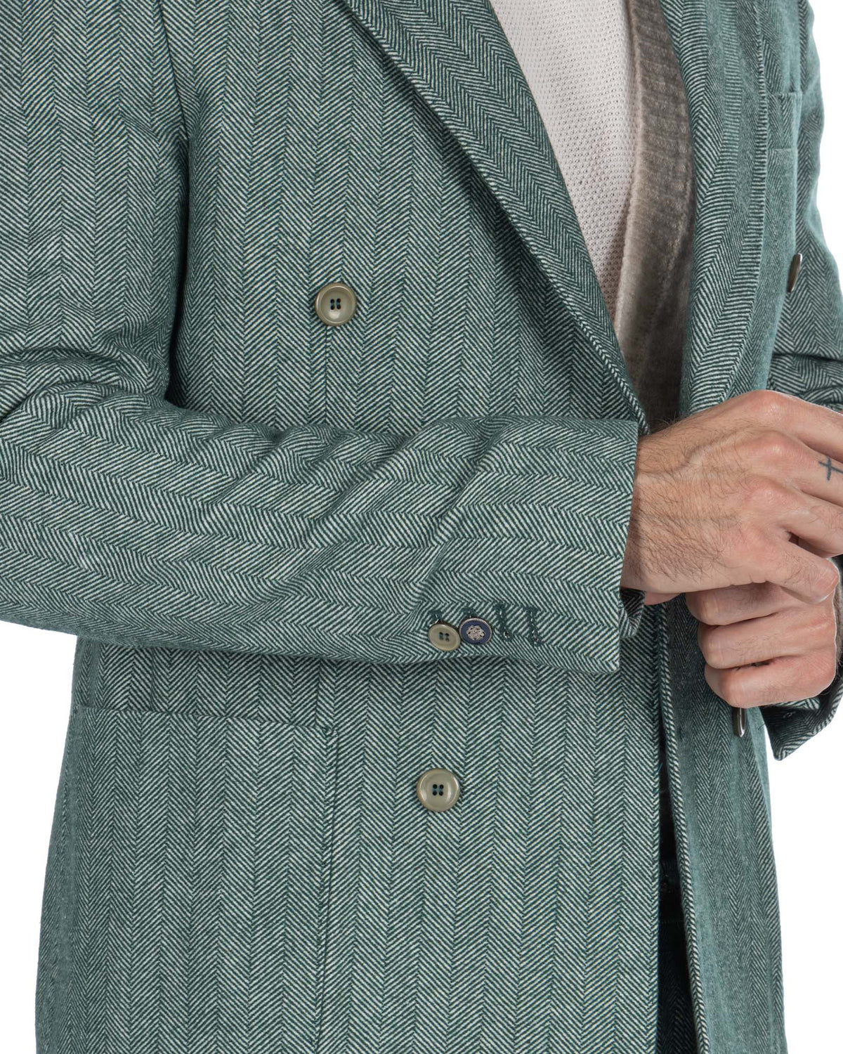 Green herringbone wool blend double-breasted blazer with notched lapels and buttoned cuffs