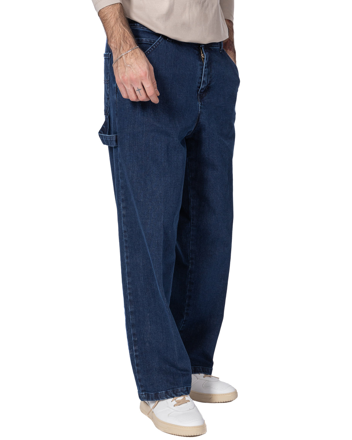 Men's dark blue denim carpenter jeans with side utility pocket, relaxed fit, zip fly, and straight leg style