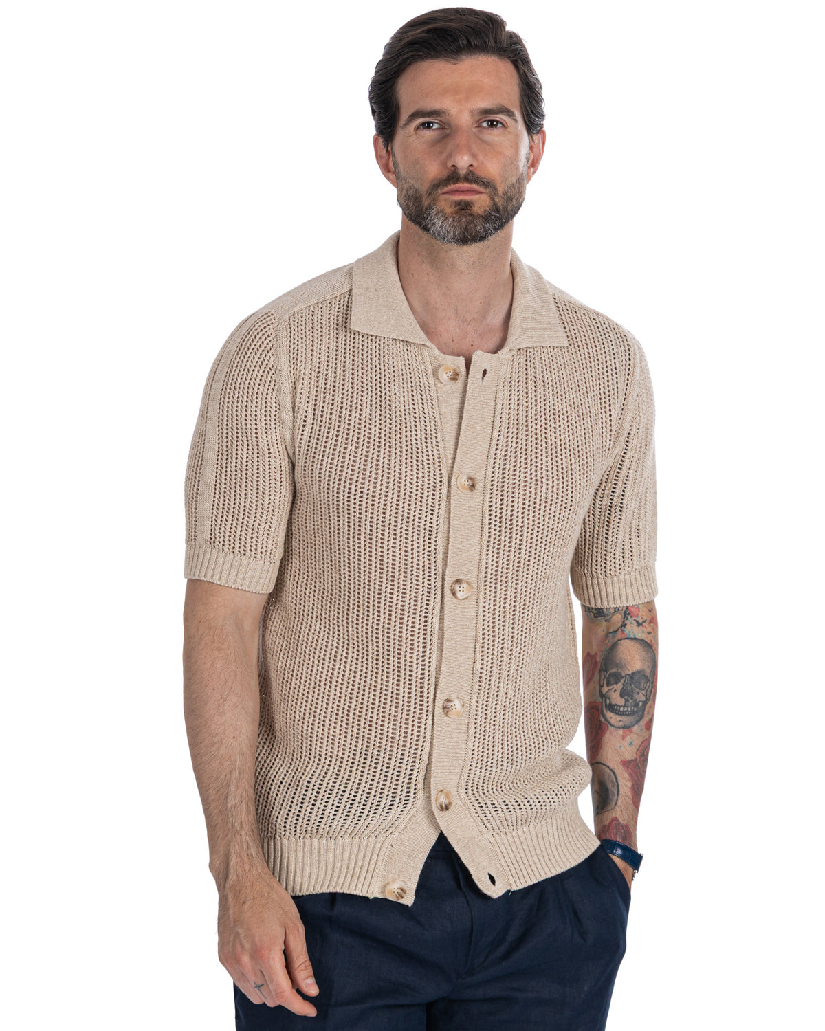 Beige short-sleeve knit cardigan with open weave texture, button front, and polo collar. Lightweight summer style.