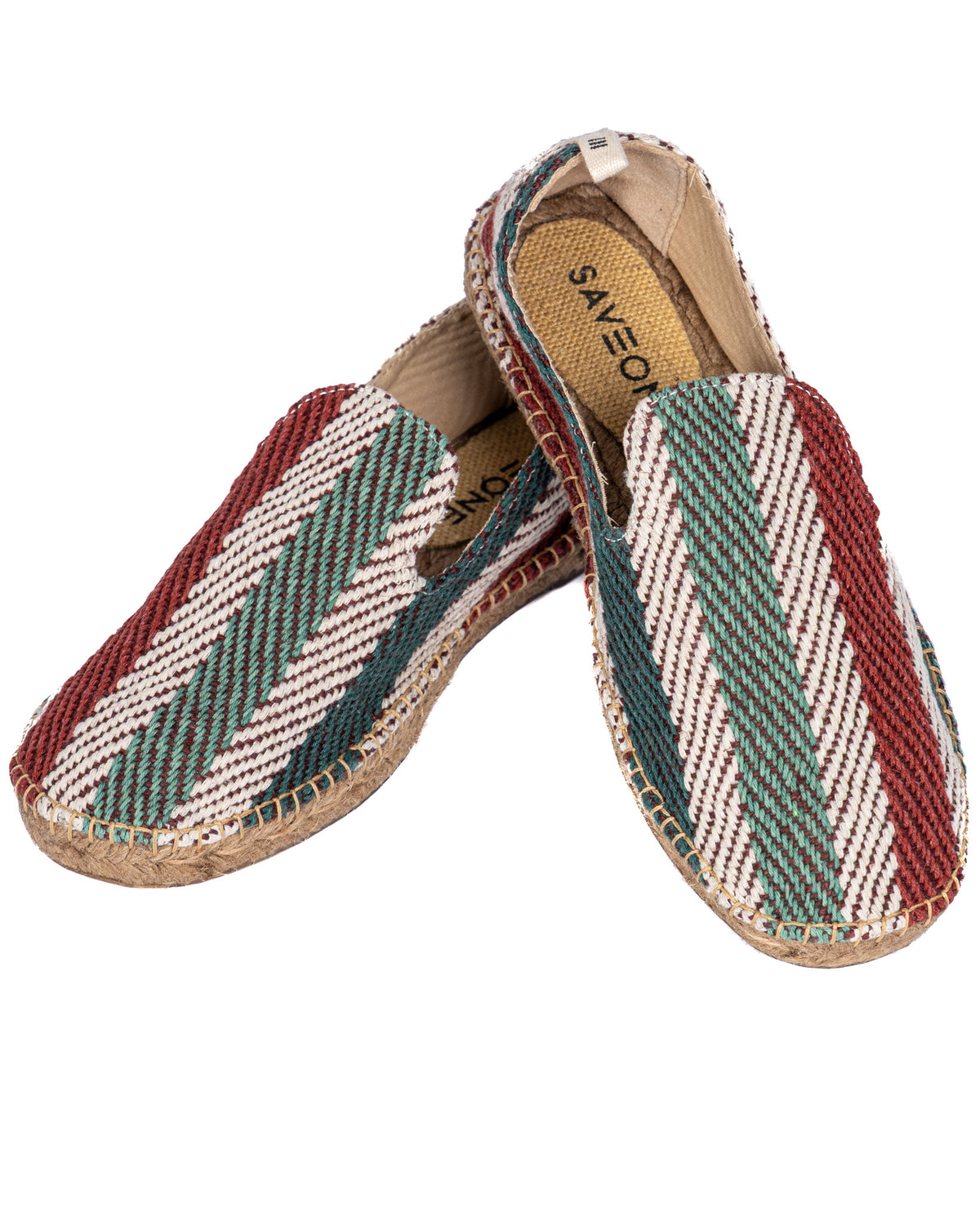 Colorful woven espadrille slip-ons with red, green, and white patterned canvas upper and jute rope sole.