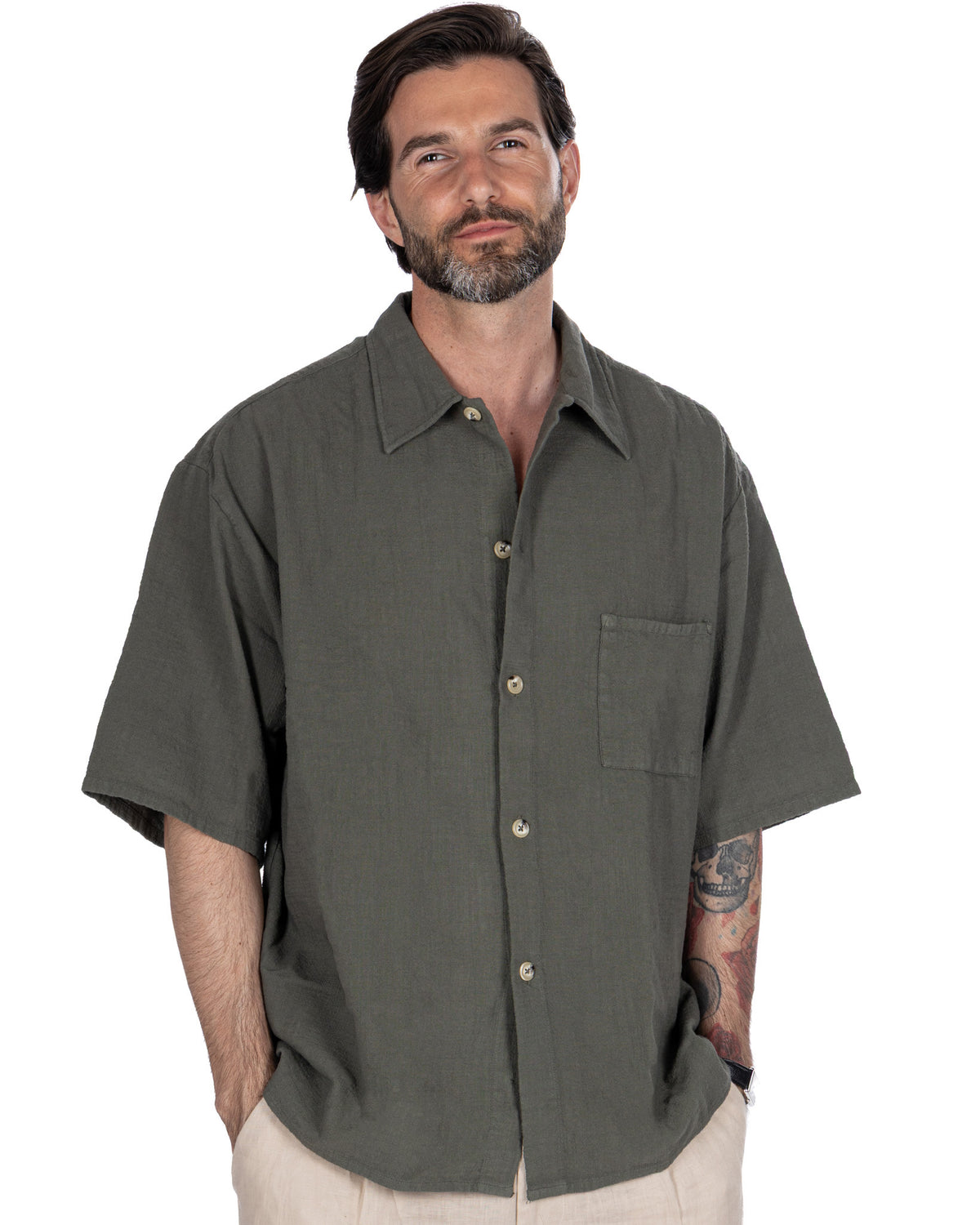 Olive green linen short sleeve button-up shirt for men, relaxed fit with chest pocket and camp collar.