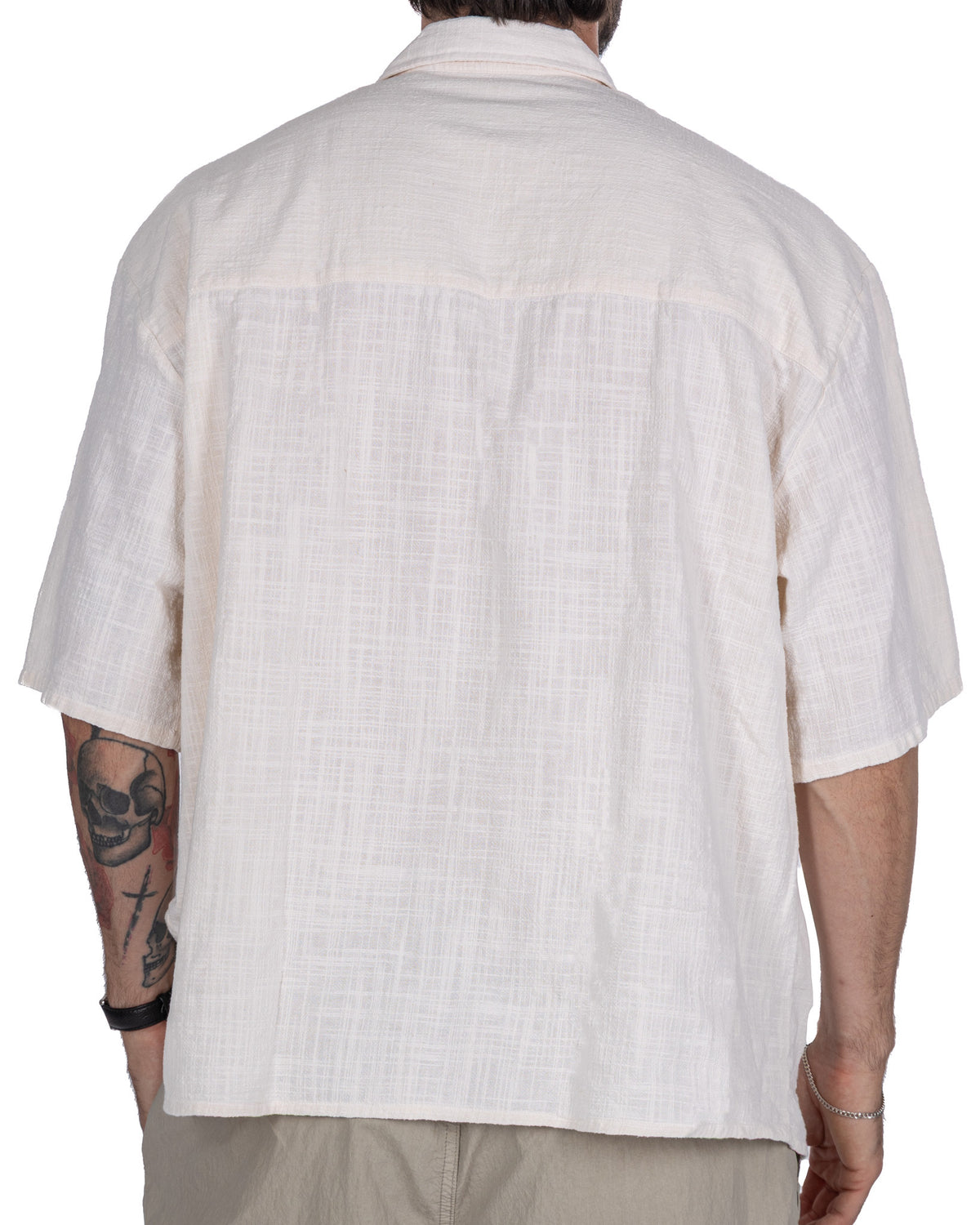 White short sleeve linen button-up shirt, relaxed fit, textured fabric, casual summer style for men
