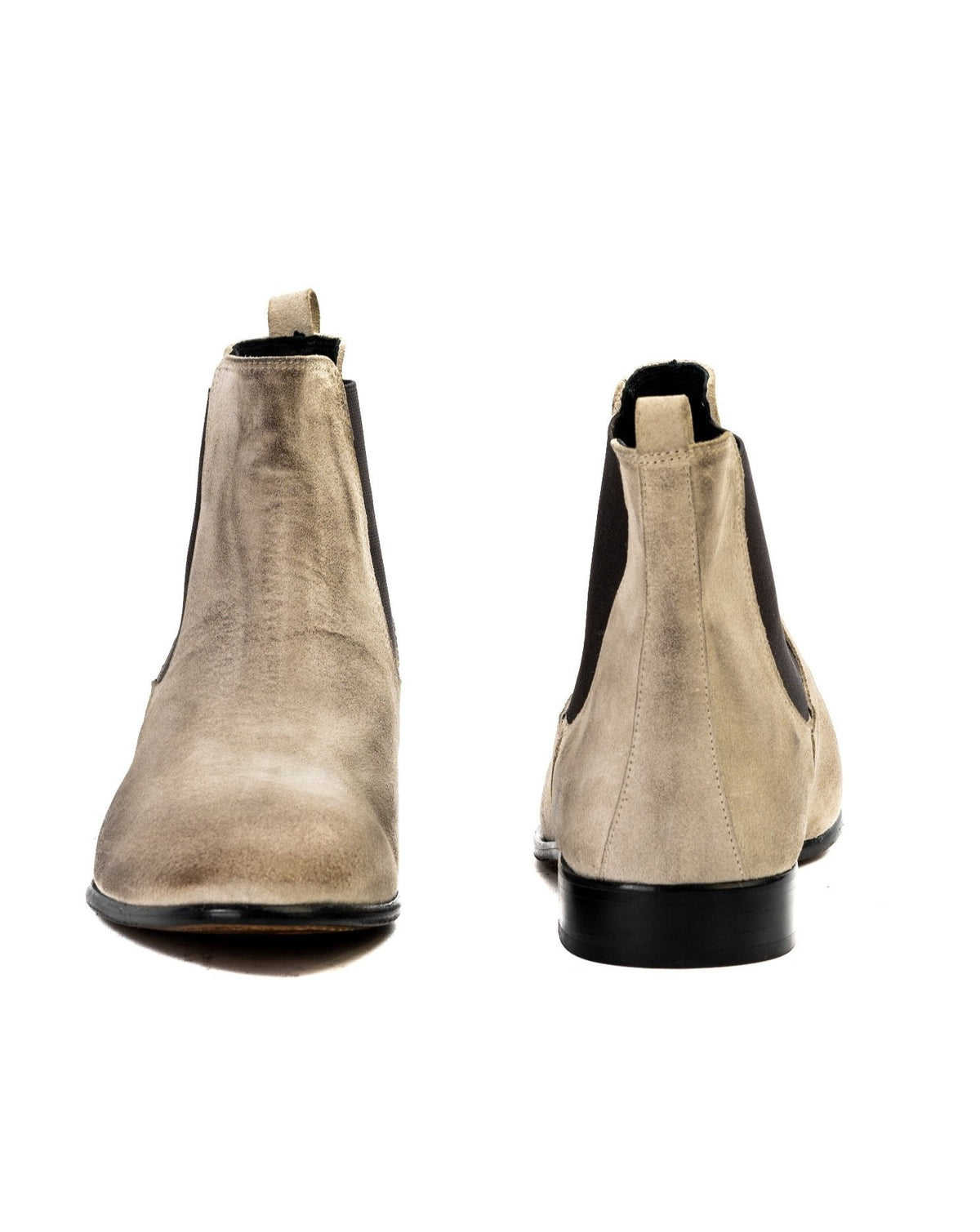 Beige suede ankle boots with black elastic panels and sleek design, perfect for stylish casual wear.