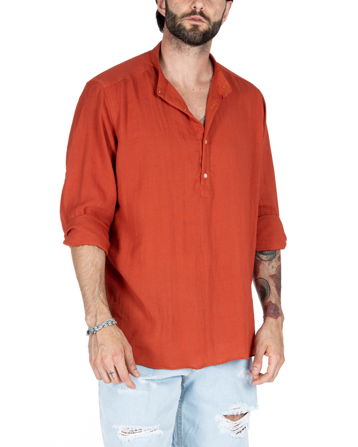 Men's rust orange half-button linen shirt with mandarin collar, shown front view on a model