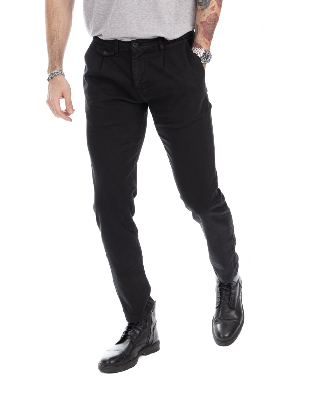 Men's black slim fit cotton chinos with tapered leg, button closure, and side pockets. Casual dress pants.