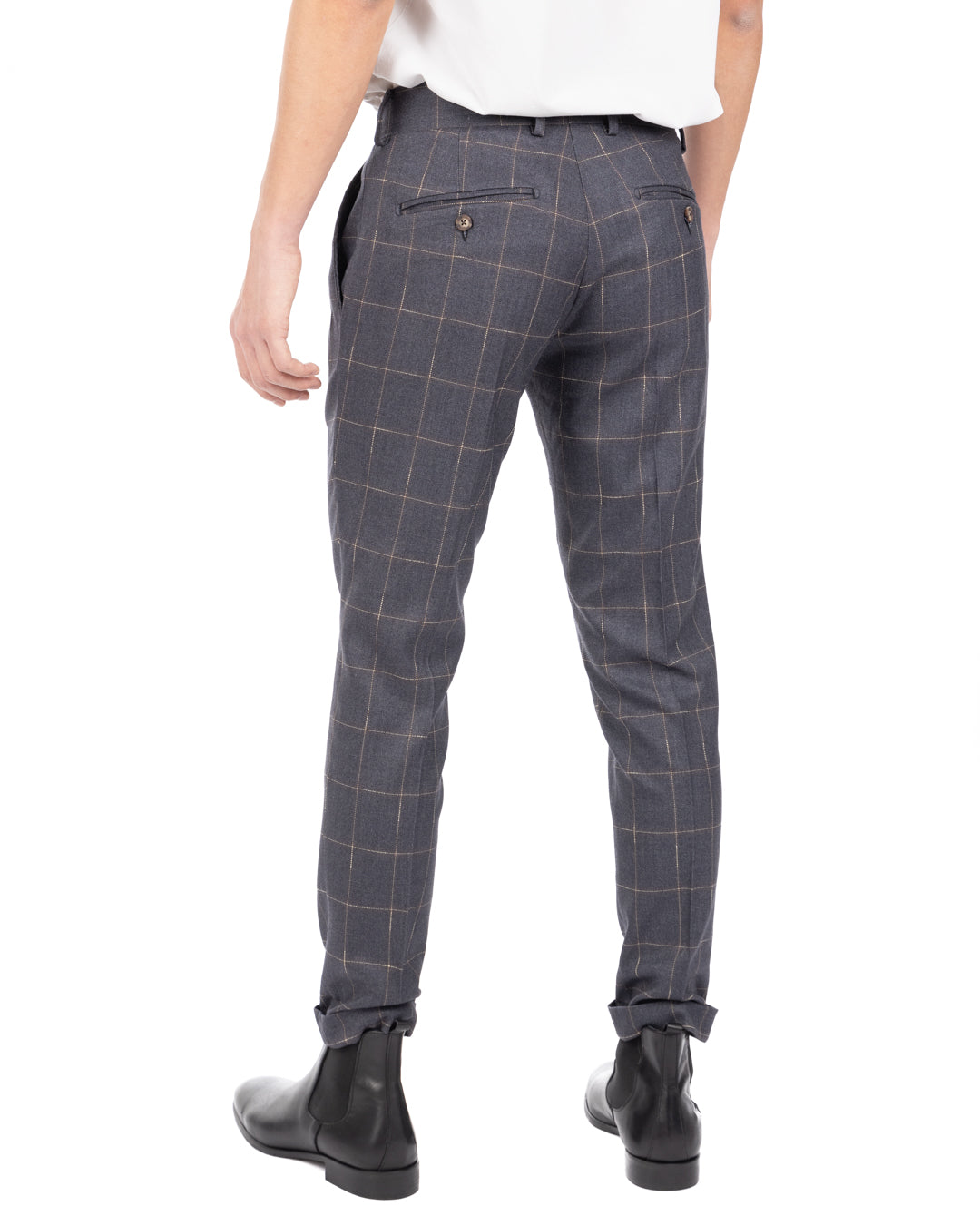 Back view of men's blue-gray windowpane check wool trousers with buttoned welt pockets and cuffed hems