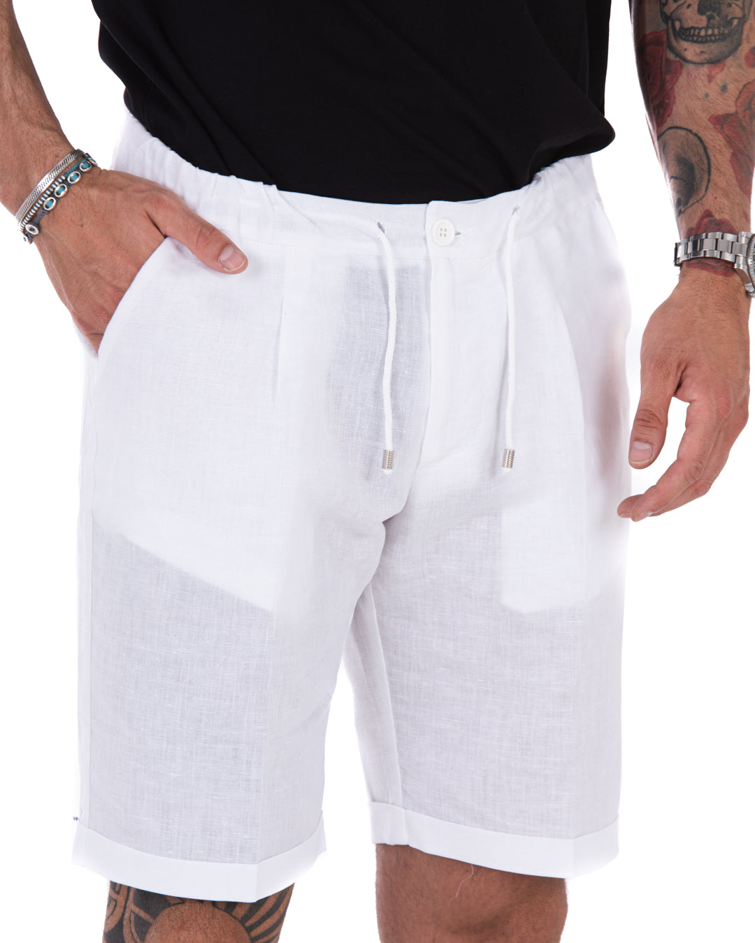 White linen drawstring shorts with elastic waist, side pockets, and cuffed hem. Men's casual summer beach shorts.